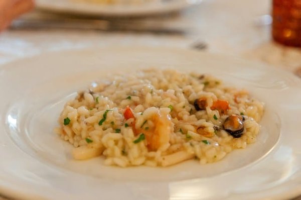 What techniques can transform everyday ingredients into a luxurious risotto?